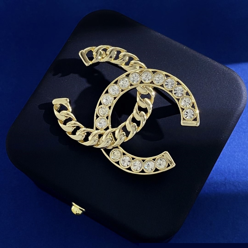 Ch*el brooches